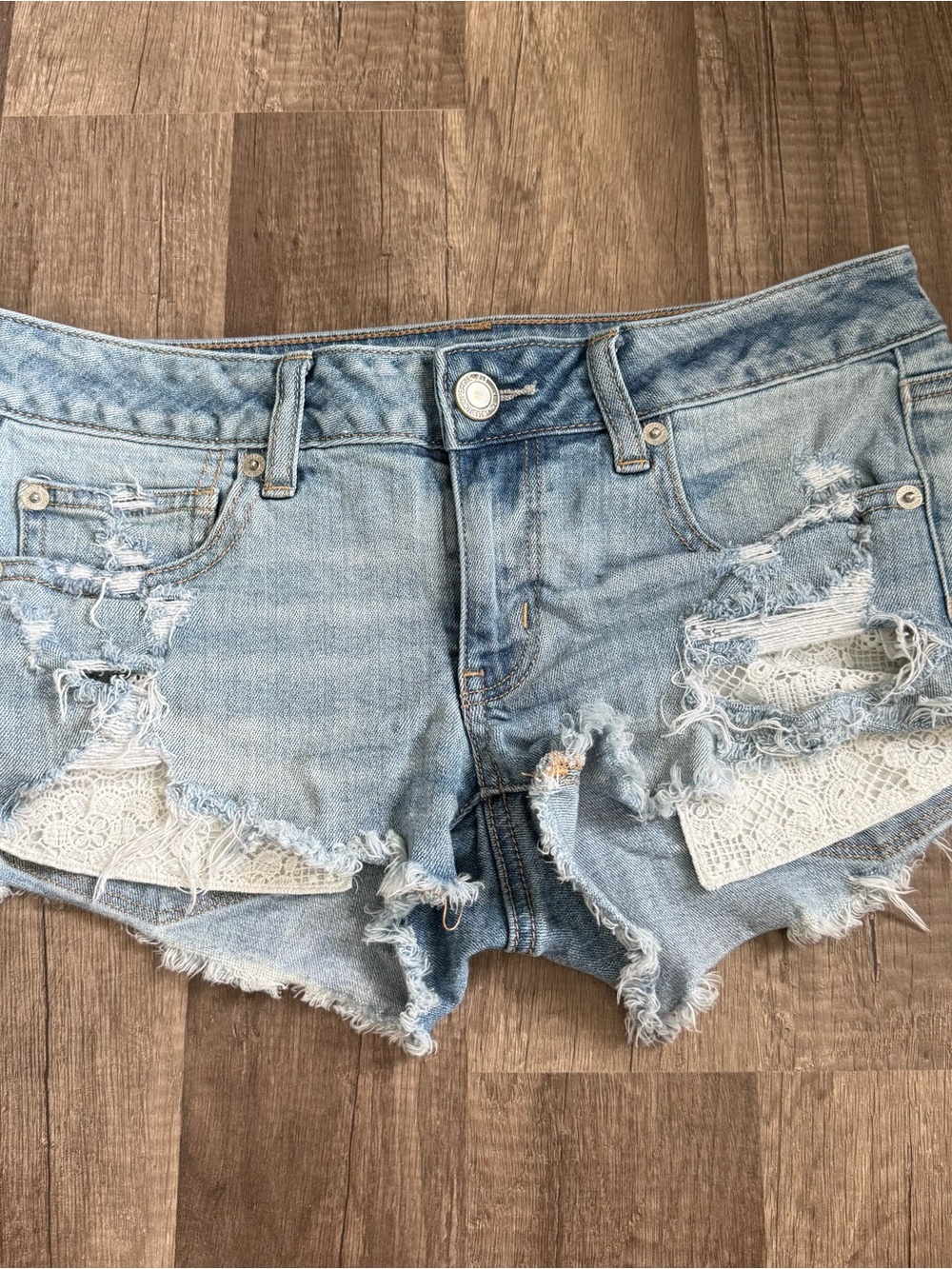American Eagle Super Low Lace Distressed Denim Shorts